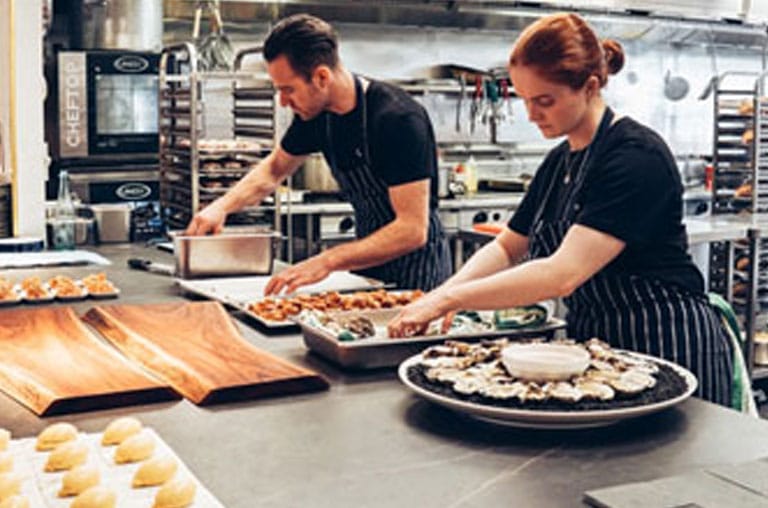 Chefs preparing food for catering in Port Melbourne